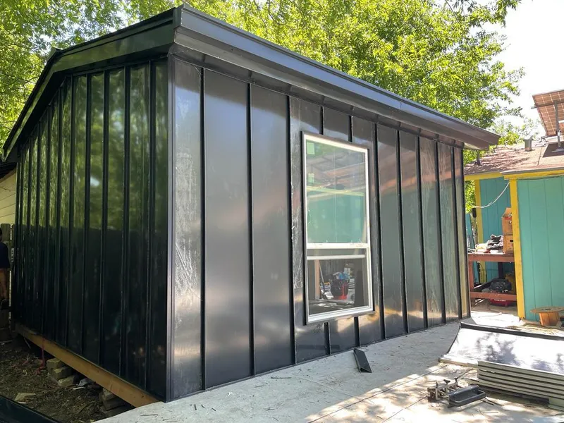 Black standing seam metal wall panels for Metal Roof Installation in Rindge