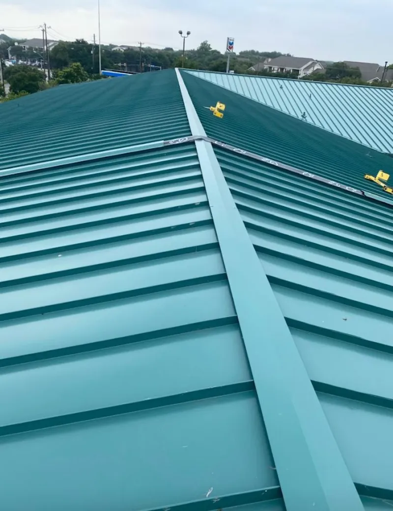 Green commercial metal roof ridge and valley for Metal Roof Repair in Rindge