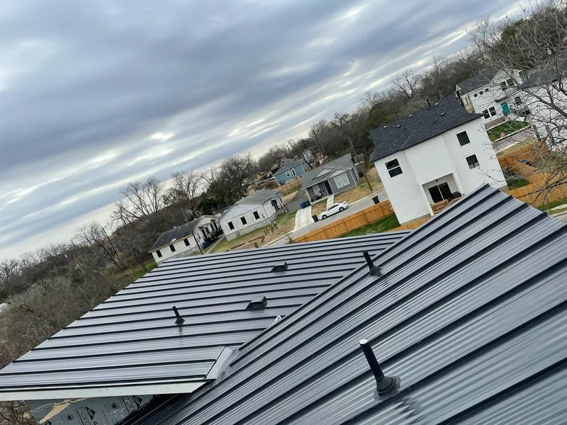 Standing seam metal roof panels with vents for Skylight Repair in Rindge
